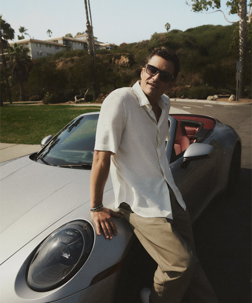 Orlando Bloom en lunettes solaires Porsche Design by De Rigo.