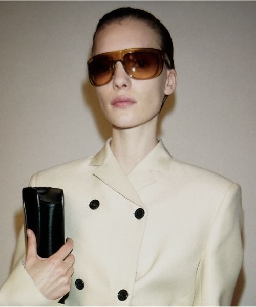 La collection de lunettes solaires Oliver Peoples x Khaite by EssilorLuxottica.